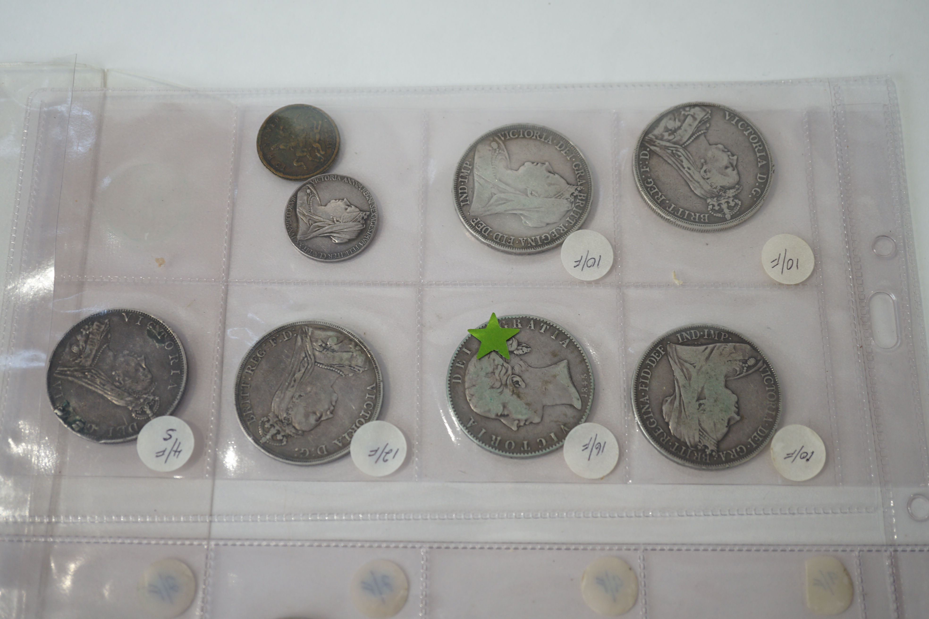 British silver coins, William IV to George VI, comprising five Victoria crowns, 1845, 1889, 1891, 1896 and 1900, a double florin, 1887 (brooch pin demounted), three George V crowns, 1935, George VI crown 1937, three half